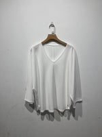 Aine Curved v neck long sleeved top.