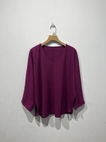 Aine Curved v neck long sleeved top.