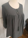 Ady cheese cloth tie front feminine style top with bobble ties.