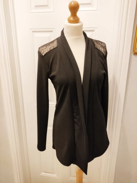 Azalea plain black jacket with lace style uper back and shoulders.