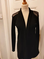 Azalea plain black jacket with lace style uper back and shoulders.