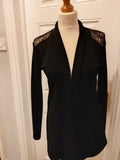 Azalea plain black jacket with lace style uper back and shoulders.