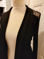 Azalea plain black jacket with lace style uper back and shoulders.