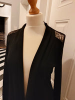 Azalea plain black jacket with lace style uper back and shoulders.