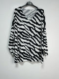 Adiea  Animal Print soft knited style v neck kinited style top. ( white and black)