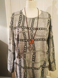 Avril chain print heart necklace pocket top dress.